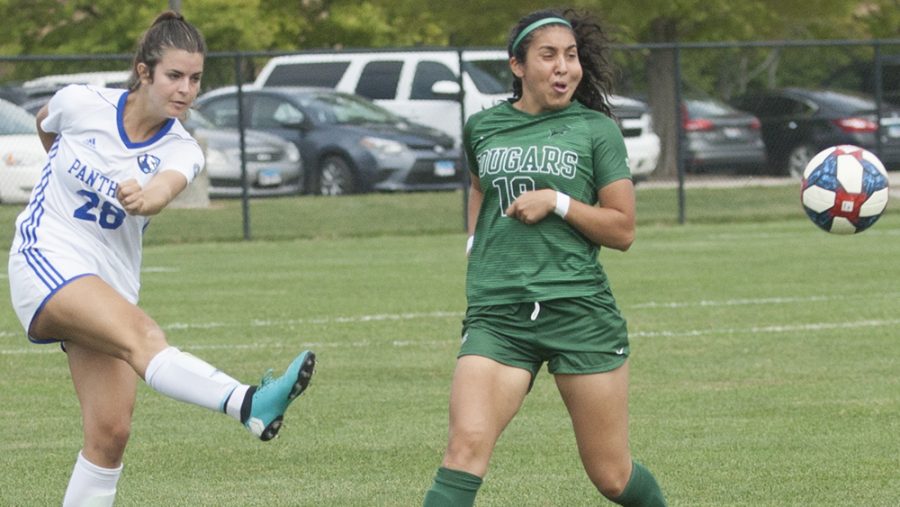 Karina Delgado | The Daily Eastern News
Rachel Pappas boots the ball up the field as a defender runs up on her during Eastern’s 3-1 victory over Chicago State Sept. 15 at Lakeside Field. That match was the first time this season Pappas was able to play a whole 90 minutes.