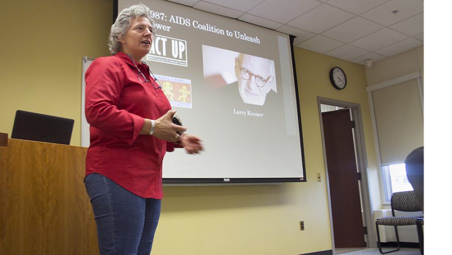 Sheila Simons, professor and graduate coordinator of the Department of Health Promotion, speaks at the “For All the People” event in Booth Library about the impact STDs have had on the medical field and society in the U.S. 