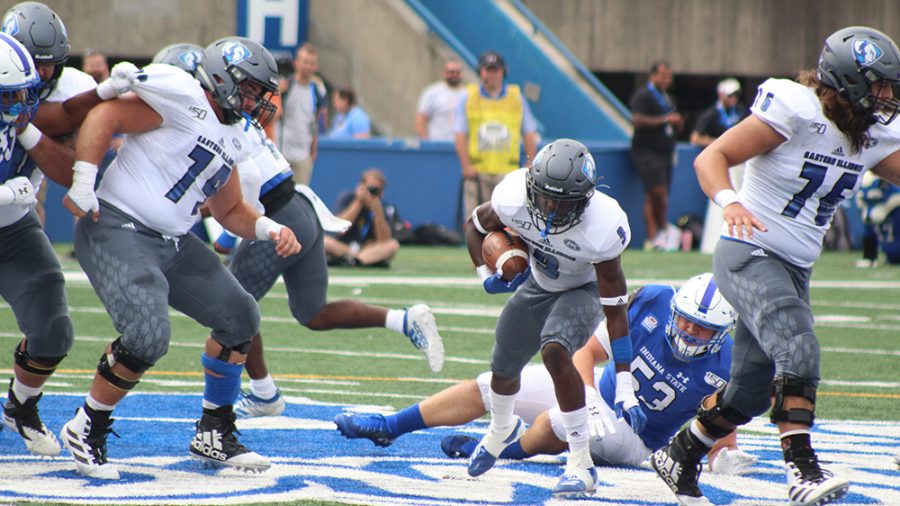 Adam Tumino | The Daily Eastern 
Runningback Jaelin Benefield avoids a tackle and breaks through the offensive line in Eastern’s 16-6 loss against Indiana State at Memorial Stadium.