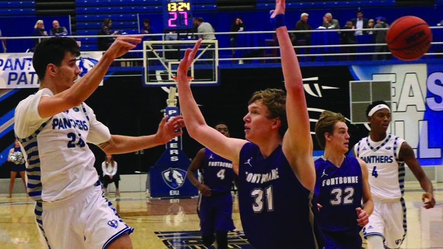 Rade Kukobat attempts a jump-pass during a fast break during Eastern’s 90-37 victory over Fontbonne University last season in Lantz Arena. The Panthers were picked to finish 7th in the OVC this season.