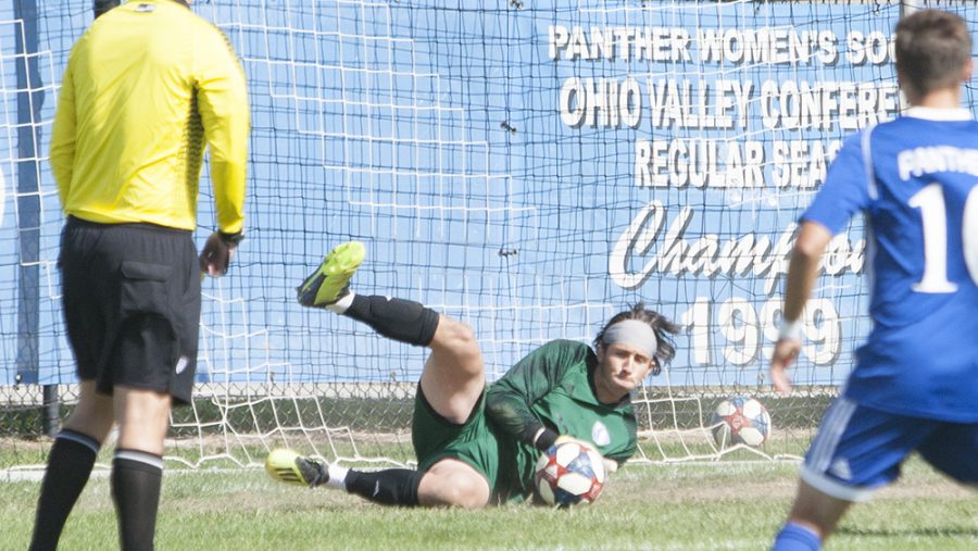 Dillan Schorfheide | The Daily Eastern News
Jonathan Burke makes a diving save off a rebound shot, coming after making an initial save on a penalty kick. Eastern tied Omaha 0-0 Oct. 19 at Lakeside Field.