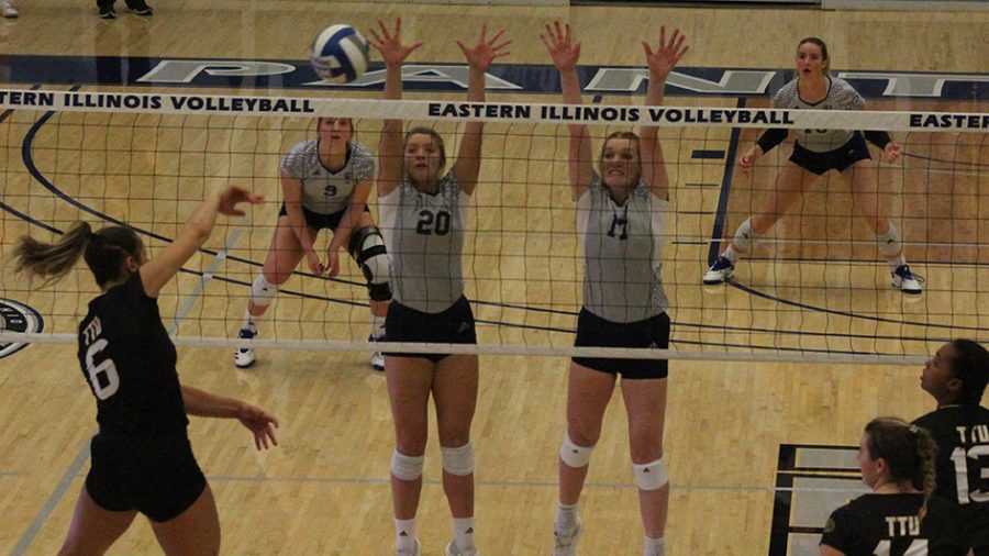 Eastern+senior+Katie+Sommer+%2820%29+and+sophomore+Hannah+Sieg+%2817%29+jump+to+attempt+a+block+against+Tennessee+Tech+on+Oct.+18+in+Lantz+Arena.+The+Panthers+won+the+match+3-2.