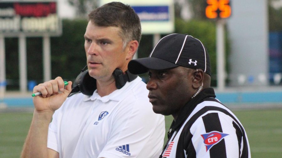 Eastern head coach Adam Cushing talks with the line judge during an official review in the Panthers’ game against Tennessee Tech last September. 