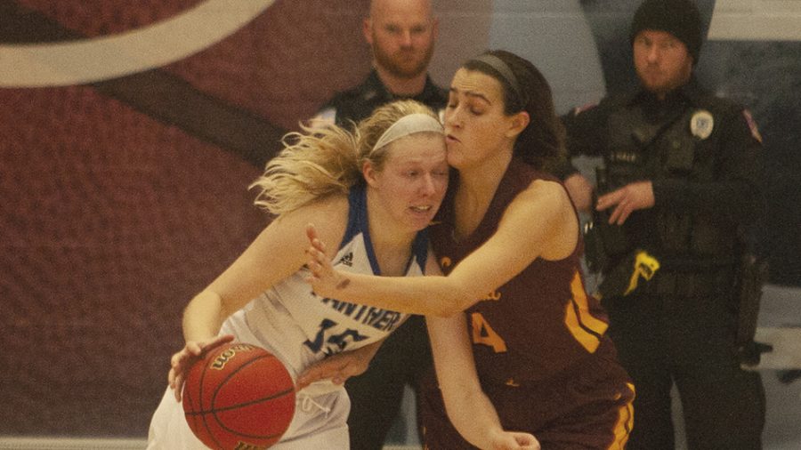 Dillan Schorfheide | The Daily Eastern News
Taylor Steele tries to drive inside against a defender. Eastern lost 67-51 against Loyola-Chicago Nov. 13 in Lantz Arena.