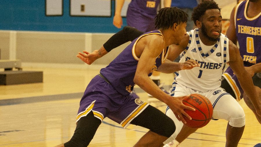 Junior guard Kashawn Charles tightly pressures the ball handler in Eastern’s 84-59 win against Tennessee Tech on Jan. 18 at Lantz Arena.