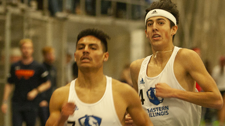 Karina Delgado | The Daily Eastern News
Jeremy Bekkouche (left) and Marcus Skinner (right) run next to each other during the men’s 1 mile run during the EIU John Craft Invite Jan. 18 in the Lantz Fieldhouse.