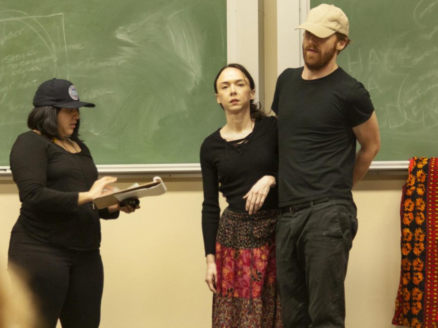 Debbie Banos, Katherine Bellantone and Nathaniel Smith, all members of the Still Point group, perform a play called “The True Cost,” based on real stories of human trafficking, at Buzzard Auditorium Thursday.  Still Point is based in Chicago.