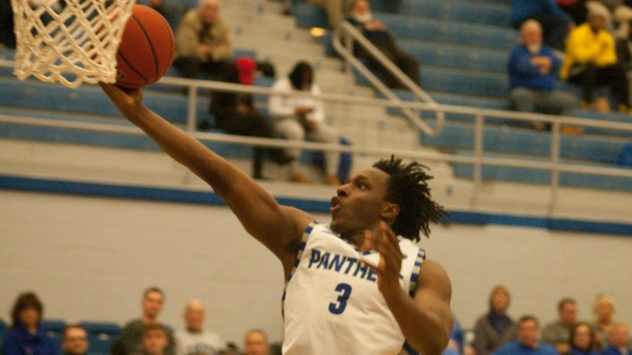 Adam Tumino | The Daily Eastern News
Mack Smith attempts a layup during Easterns 76-74 loss to SIUE Thursday in Lantz Arena.