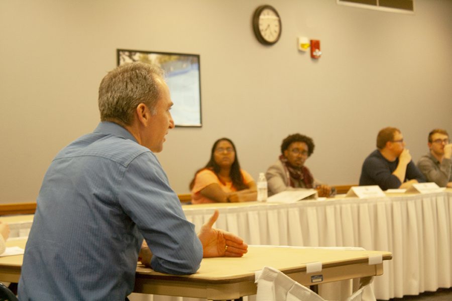 Jeffrey Stowell, chair of Textbook Rental task force, talks to the Student Senate Wednesday about 11 recommendations for why switching to digital textbooks would be beneficial. 