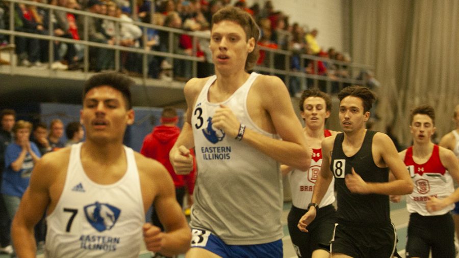 Eastern junior Jeremy Bekkouche (left) and sophomore Nick Oakley compete in the EIU John Craft Invite Jan. 18 in the Lantz Field House. Both the men’s and women’s teams placed first in the event.