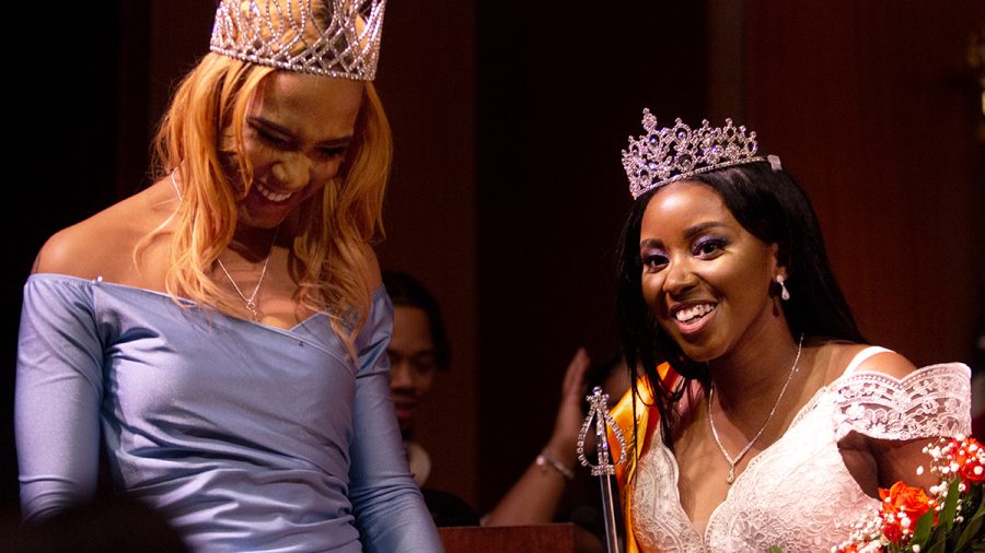 Latricia Booker, a junior majoring in pre-nursing and Miss Black EIU 2019, and Mikayla Sanford, a biological science major, celebrates together after Sanford’s crowing as Miss Black EIU 2020 in the Grand Ballroom in the Martin Luther King Jr. University Student Union on Saturday night. The two took several photos together as the previous and currently reigning queens.