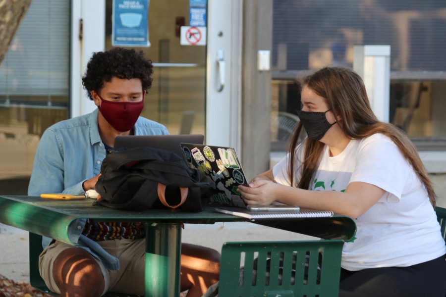 Josiah Wright (left), a junior mathematics education major, and Emily Weber, a sophomore mathematics education major, study together in the Library Quad.