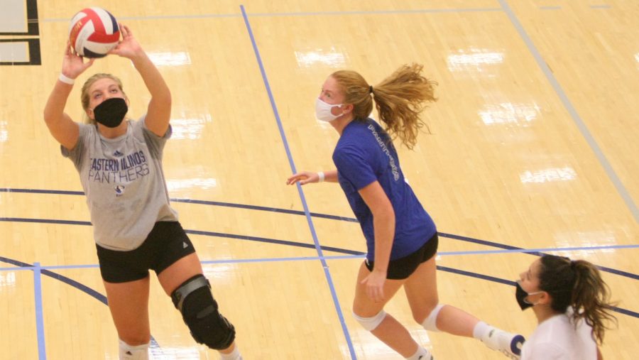 Eastern junior setter Bailey Chandler sets up a teammate for a kill opportunity during a practice on Oct. 8 in Lantz Arena.