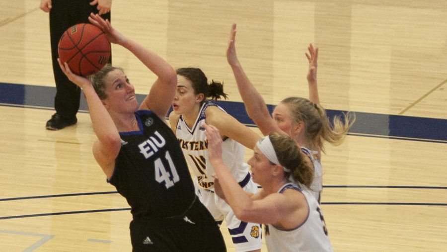 Eastern+junior+Abby+Wahl+attempts+a+shot+against+Western+Illinois+Sunday+in+Lantz+Arena.+Wahl+recorded+her+third+double-double+on+the+season+with+15+points+and+10+rebounds+and+Eastern+won+88-74.