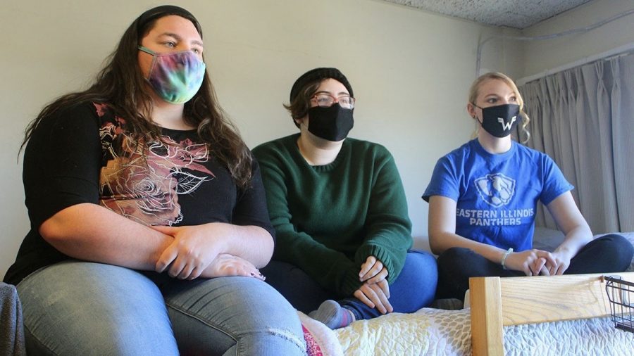 Caeli Haab (left), a freshman psychology major, Logan Rasmus, a freshman psychology major, and Lilly Pampel, a freshman with an undecided major, all watch the presidential inauguration in Pampels dorm. Haab said she was interested in the election because she was able to vote in the election, and she felt that it was important to learn about the candidates and to be able to interact with people about the candidates.