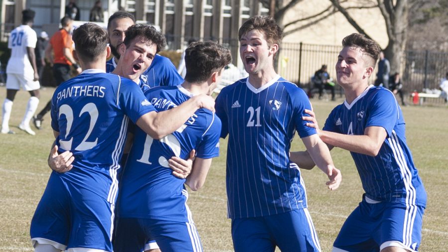 The Eastern mens soccer team celebrates a goal from forward Maxwell Allen (15) in the Panthers 2-2 tie against Kansas City March 6.