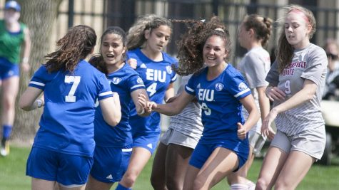 Members of the Eastern womens soccer team celebrate a penalty kick goal by senior forward Itxaso Aguero (7) that put Eastern up 1-0 against Jacksonville State on March 30 at Lakeside Field. Aguero would add another goal later on and the Panthers beat the Gamecocks 3-2.