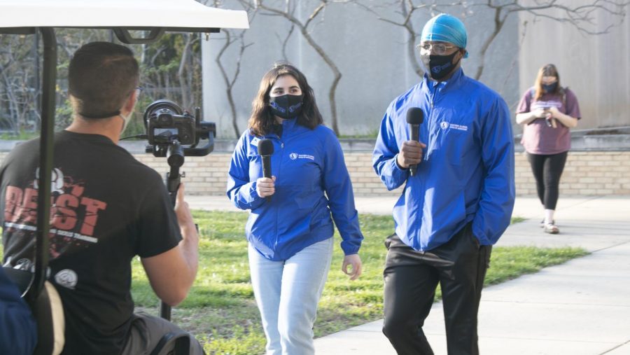 Tour guides, Bri and Xsaviar, walk around campus for a Facebook live tour of EIU’s campus to kick off #EIUGoTimeWeek. #EIUGoTime is a social media campaign where individuals can share why they picked Eastern through social media.