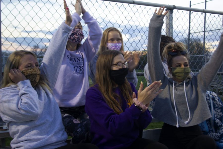 A group of students cheers during an intramural kickball game between Sigma Alpha Epsilon and Sigma Nu on Tuesday evening. Yesterdays game was the last before the championship which will be held on Monday, April 19.