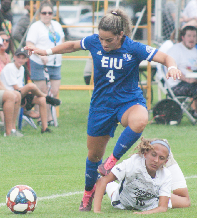 Eastern defender Eva Munoz pushes by an Illinois Springfield player in a match Aug. 22 at Lakeside Field. Eastern won the match 3-0.