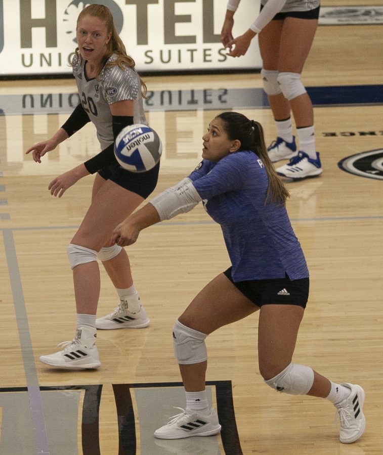 Eastern libero Christina Martinez Mundo receives a serve in a match against Northern Illinois on Sept. 2 in Lantz Arena. Mundo had 26 digs in the match, which Eastern won 3-1. 
