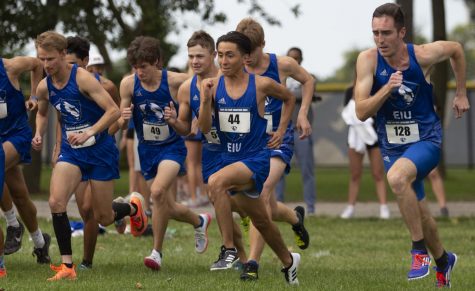 The Eastern mens cross country team races from the starting line to begin the EIU Walt Crawford Open at the Tom Woodall Panther Trail on Sept. 3. Both the mens and womens team placed first in the open. 