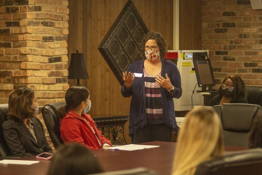 Tanya Willard, Coordinator for the Gender and Sexual Diversity Center, presents a slideshow on what pronouns are and how to use them during the Wednesday Student Government meeting. 