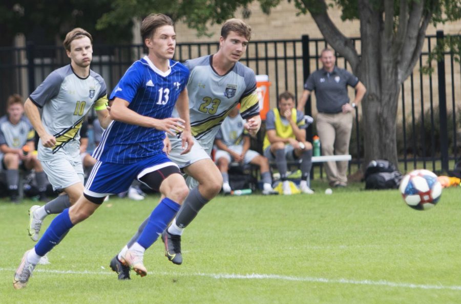 Eastern midfielder Chad Hamler races a pair of opponents to the ball in a match against Purdue Fort Wayne on hjttytytttt rr5rrr554er                                                                                                                                                                                                                                                                                                                                                                                                                                                                                                                                                                                                                                                                                                                                                                                                                                                                                                                                                                                                                                                                                                                                                                                                                                                                                                                                                                                                                                                                                                                                                                                                                                                                                                                                                                                                                                                                                                                                                                                                                                                                                                                                                                                                                                                                                                                                                                                                                                                                                                                                                                                                                                                                                                                                                                                                                                                                                                                                                                                                                                                                                                                                                                                                                                                                                                                                                                                                                                                                                                                                                                                                                                                                                                                                                                                                                                                                                                                                                                                                                                                                                                                                                                                                                                                                                                                                                                                                                                                                                                                                                                                                                                                                                                                                                                                                                                                                                                                                                                                                                                                                                                                                                                                                                                                                                                                                                                                                                                                                                                                                                                                                                                                                                                                                                                                                                                                                                                                                                                                                                                                                                                                                                                                                                                                                                                                                                                                                                                                                                                                                                                                                                                                                                                                                                                                                                                                                                                                                                                                                                                                                                                                                                                                                                                                                                                                                                                                                                                                                                                                                                                                                                                                                                                                                                                                                                                                                                                                                                                                                                                                                                                                                                                                                                                                                                                                                                                                                                                                                                                                                                                                                                                                                                                                                                                                                                                                                                                                        Sept. 7 at Lakeside Field. Hamler had a shot in the game, which Eastern lost 1-0. 