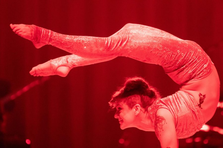 Rachel Barringer, a contortion performance artist, perfoms with the Boston Circus Guild inside the Dvorak Concert Hall in the Doudna Fine Arts Center on Sept. 28.