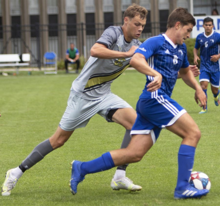 Eastern midfielder Alejandro Lurbe runs by an opponent in a match against Purdue Fort Wayne on Sept. 3 at Lakeside Field. Eastern lost the match 1-0. 