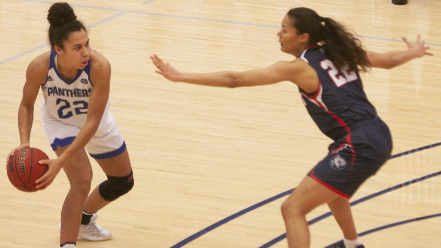 Eastern guard Lariah Washington looks to pass the ball into the paint in a game against Belmont Feb. 4 in Lantz Arena. Washington led the team with 23 points in the game, which Eastern lost 77-75.