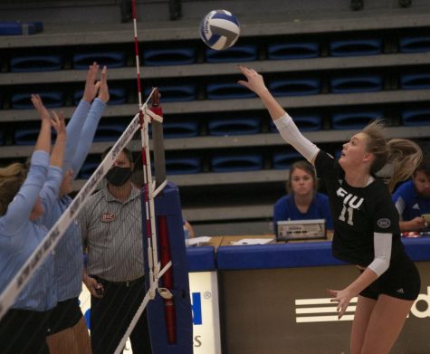 Eastern outside hitter Kaitlyn Flynn follows through on a kill attempt in a match against Indiana State on Sept. 19 in Lantz Arena. Flynn had 10 kills and 10 digs in the match, which Eastern lost 3-1.
