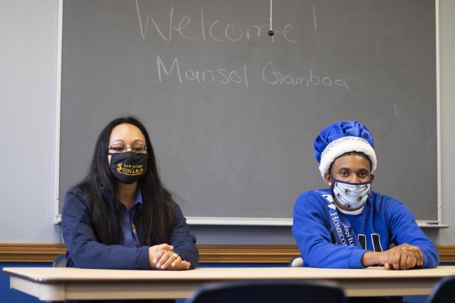 Jerimiah Boyd-Johnson, a senior political science major, presents Marisol Gamboa, a candidate for the University police, and opens the room for questions inside the Paris room of the Martin Luther King Jr. University Union. 