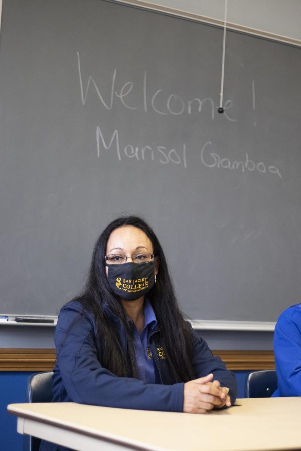 Marisol Gamboa, a candidate for the university police, answers questions from students inside the Paris room of Martin Luther King Jr. University Union. 