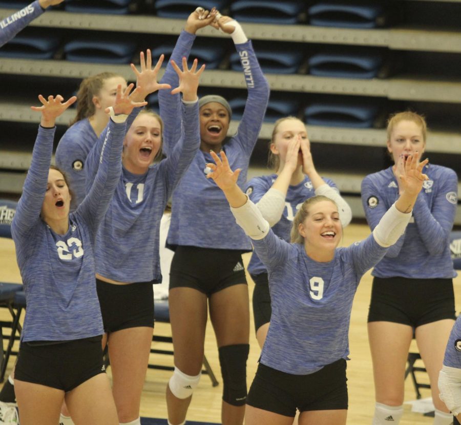 Members+of+the+Eastern+volleyball+team+celebrate+a+point+from+the+bench+during+Easterns+match+against+Tennessee+State+Saturday+at+Lantz+Arena.+Eastern+won+the+match+3-1.+
