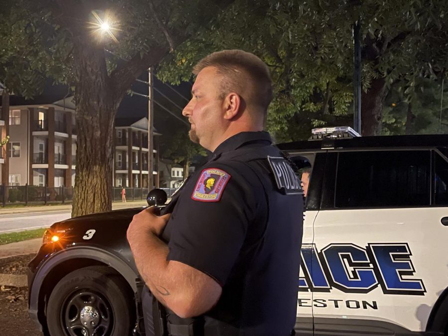 by CORRYN BROCK | THE DAILY EASTERN NEWS
Charleston Police Department Officer Brian Siefferman stands watch outside of a of bar after closing. Siefferman served at two departments before coming to CPD.