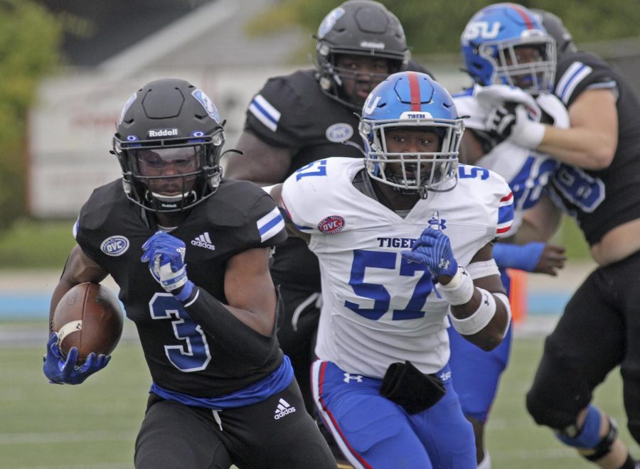 Eastern running back Jaelin Benefield avoids a Tennessee State player while running the ball at the Homecoming Game on Oct. 23 at OBrien Field. Benefield ran for 56 yards in the game, which the Panthers lost to the Tigers by a score of 28-0. 