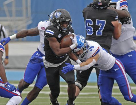 Eastern running back Kendi Young runs the ball past a defender in the Panthers Homecoming Game against Tennessee State on Oct. 23. Eastern lost 28-0 to the Tigers at OBrien Field.