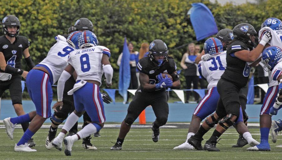 Eastern running back Harrison Bey-Buie attempts to run the ball past the Tennessee State defensive line in the Panthers' Homecoming Game on Oct. 19 at O'Brien Field. Bey-Buie was named to the OVC All-Newcomer after the season.