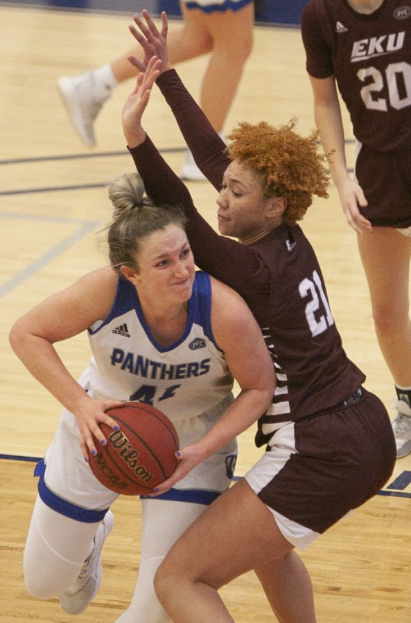 Eastern forward Abby Wahl pushes through a defender in a game against Eastern Kentucky on Jan. 16. Whal had 10 points and 9 rebounds in the game, which Eastern won 73-68.