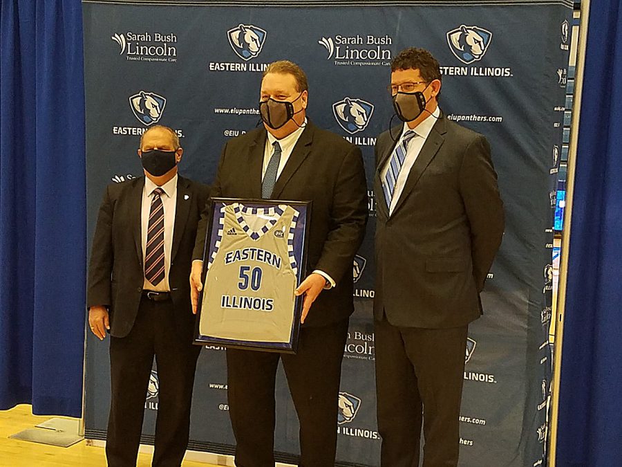Eastern men's basketball Marty Simmons (center) poses with Eastern President David Glassman (left) and Athletic Director Tom Michael in his introductory press conference on April 1, 2021 in Lantz Arena. 
