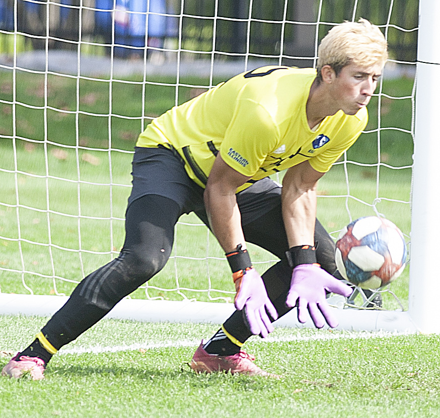 Eastern goalkeeper Jonathan Burke reaches down to make a save in a match against Omaha Oct. 9 at Lakeside Field. Burke had 11 saves in the match, but Eastern lost 2-1.