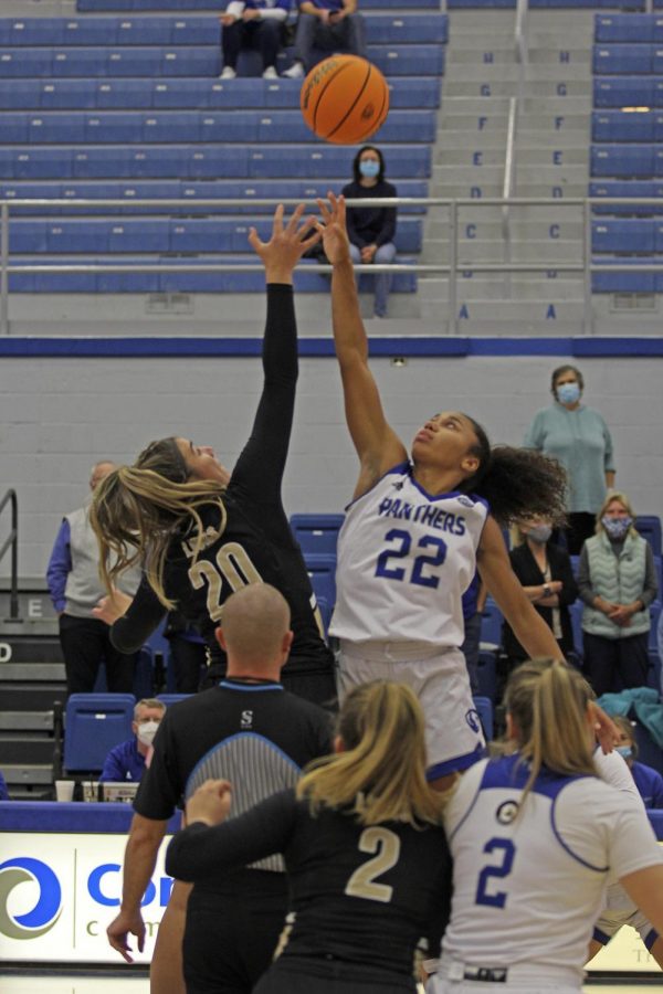 Lariah Washington, a junior guard, jumps for the ball at the tipoff for the women’s basketball game Tuesday night against Lindenwood. Washingotn led the team with 16 points. The Panthers won 86-30.
