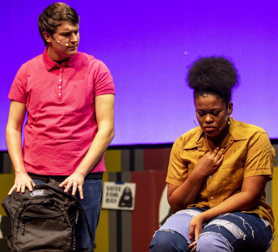 Chuck Westendorf, a sophomore digital media major who plays Colin, talks to Raylynn who is played by Brea Howard, a freshman theatre arts major, in “Blood at the Root” play at Doudna Fine Arts Center Theatre Thursday night