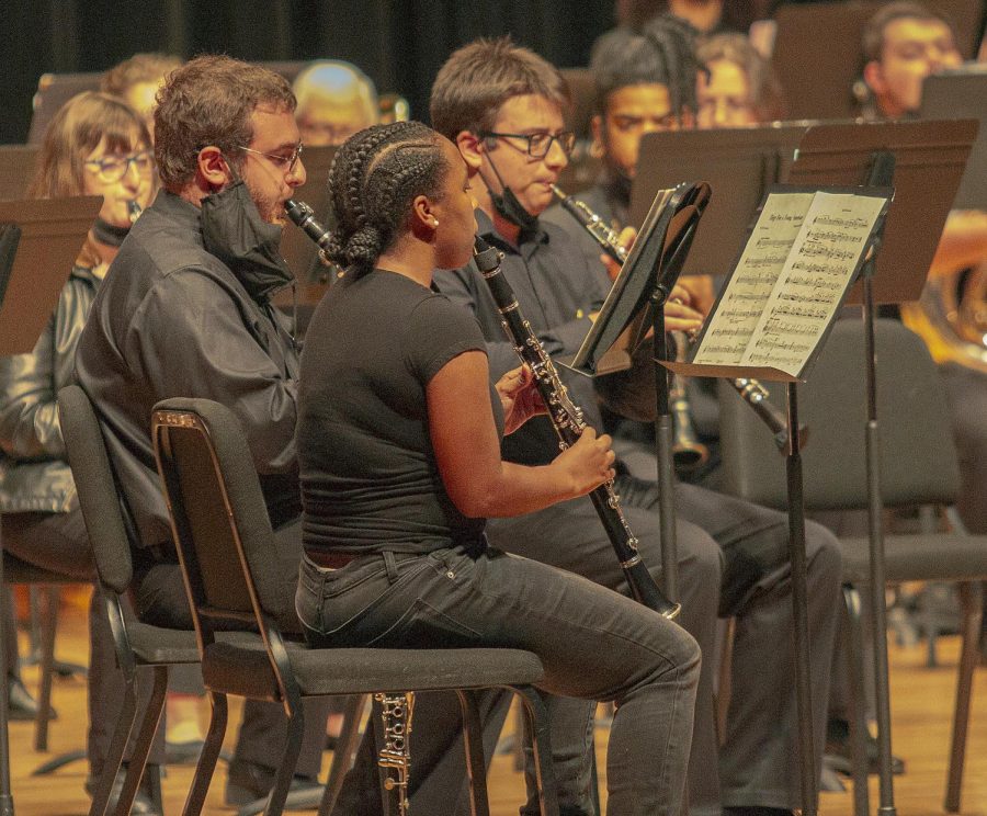 Students play the clarinet at Thursday night’s Wind Symphony Band performance at Doudna Fine Arts Center in Dvorak Concert Hall.