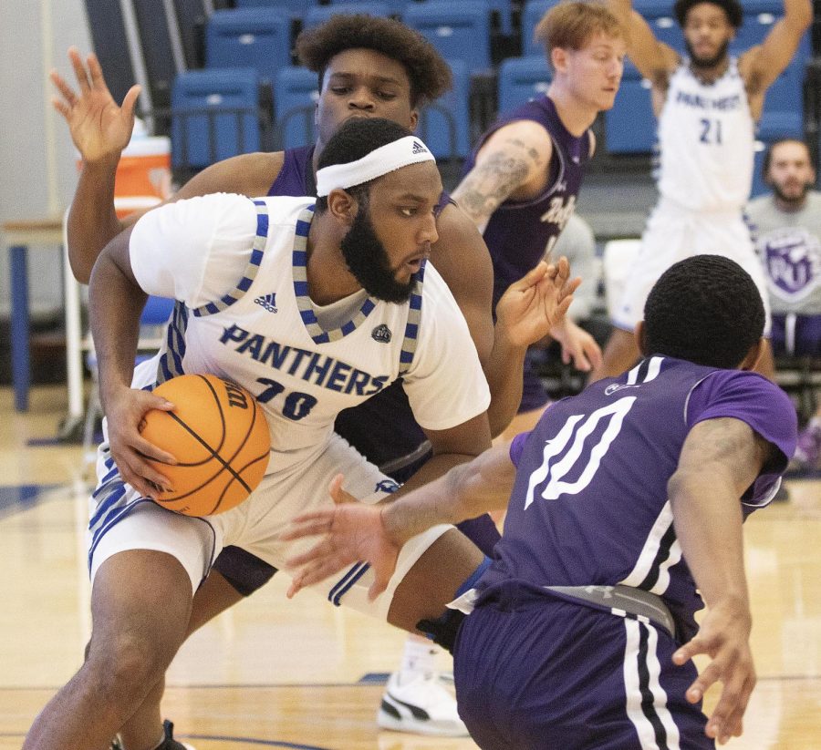 Eastern forward Sammy Friday IV makes a move in the paint during Thursday nights game against Rockford in Lantz Arena. Friday IV set a new career high with 21 points in the game, which Eastern won 96-64. 