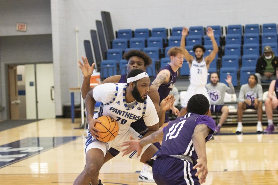Eastern forward, Sammy Friday IV, makes a move in the paint during Thursday night’s game in Lantz Arena. The Panthers beat the Rockford Regents 96-64. 