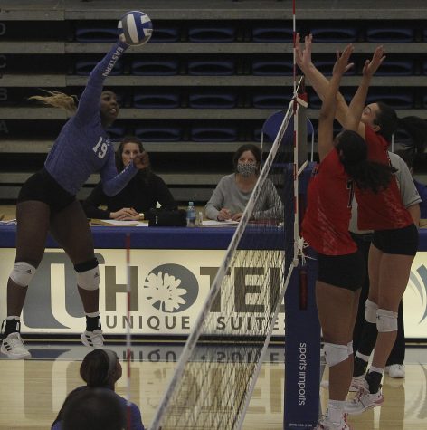 Eastern outside hitter Danielle Allen swings on a kill attempt in a match against Austin Peay on Nov. 13 in Lantz Arena. Allen had a team-high 22 kills in the match, which Eastern lost 3-1.