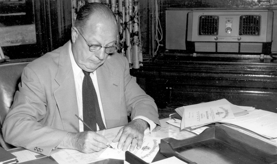 PHOTO COURTESY OF THE KEEP
Black and white photograph of President Robert Guy Buzzard, seated at his desk and signing diplomas. Date of photograph is approximate. Buzzard served as president of Eastern Illinois University from 1933 to 1956.