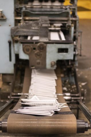 This is the conveyor belt from the folding unit which conveys the cut and folds into the newspaper that comes off the printing press line. 